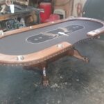Dealer poker table with custom cloth.