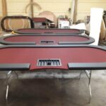 Folding dealer tables.