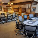 Tournament poker tables ready for play.